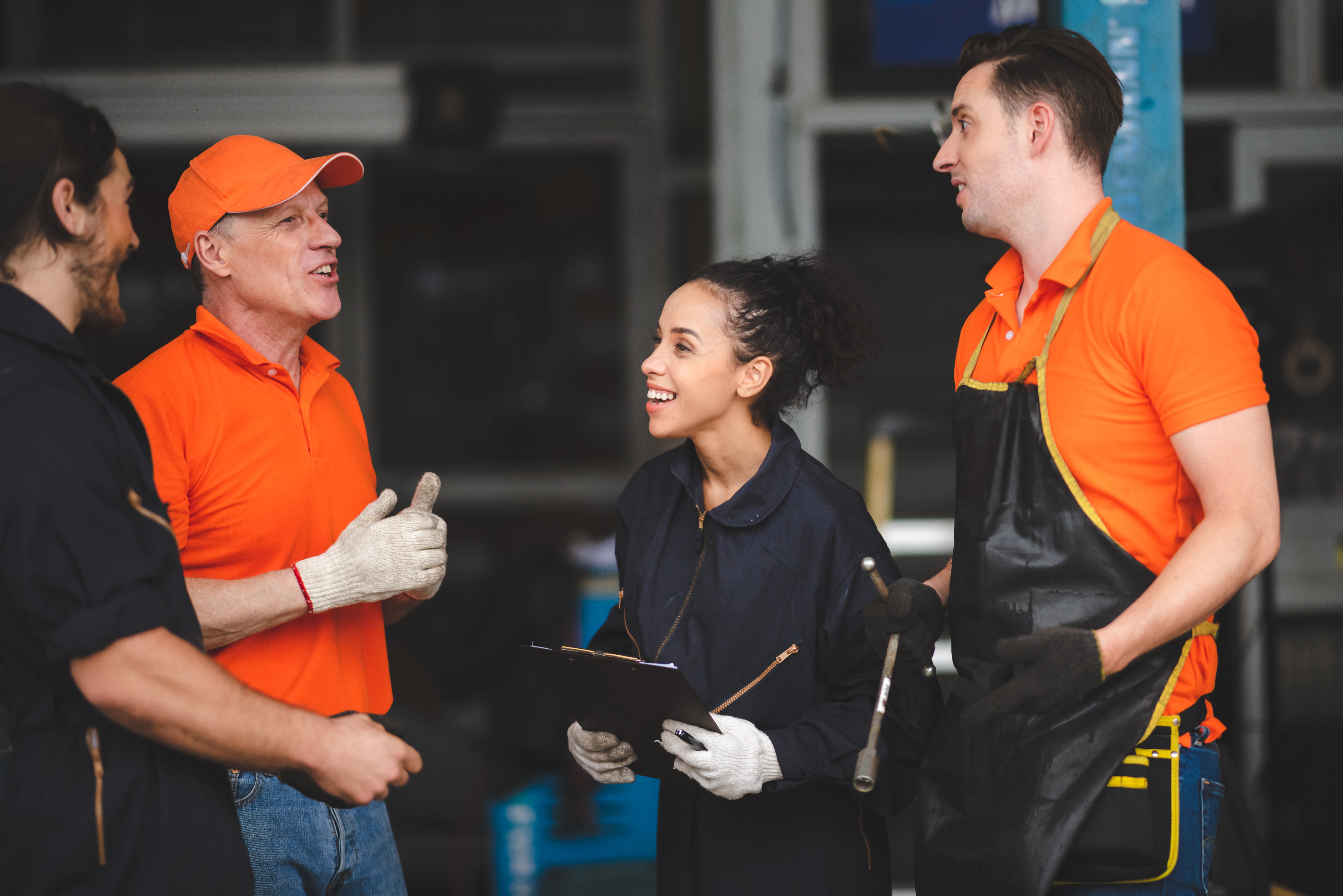 Factory workers in discussion